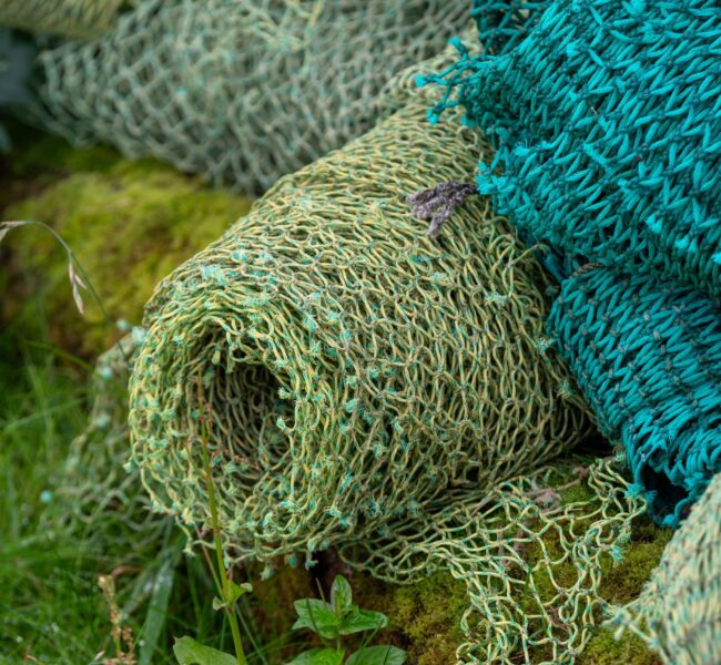 colorful-fishing-nets-piled-up-2026-01-07-06-39-07-utc