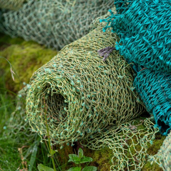 colorful-fishing-nets-piled-up-2026-01-07-06-39-07-utc
